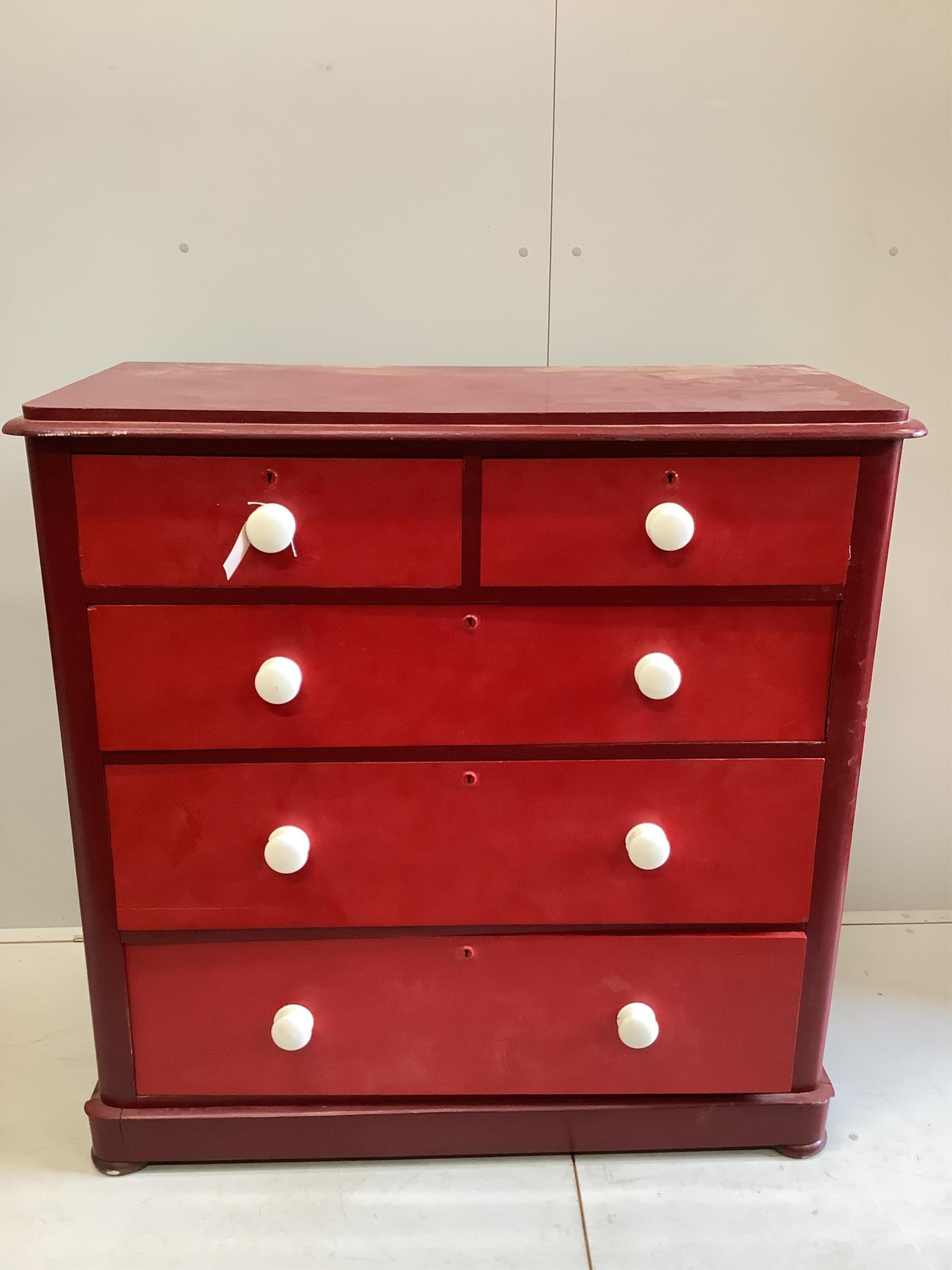 A Victorian pine chest, later painted red, width 114cm, depth 52cm, height 115cm. Condition - fair